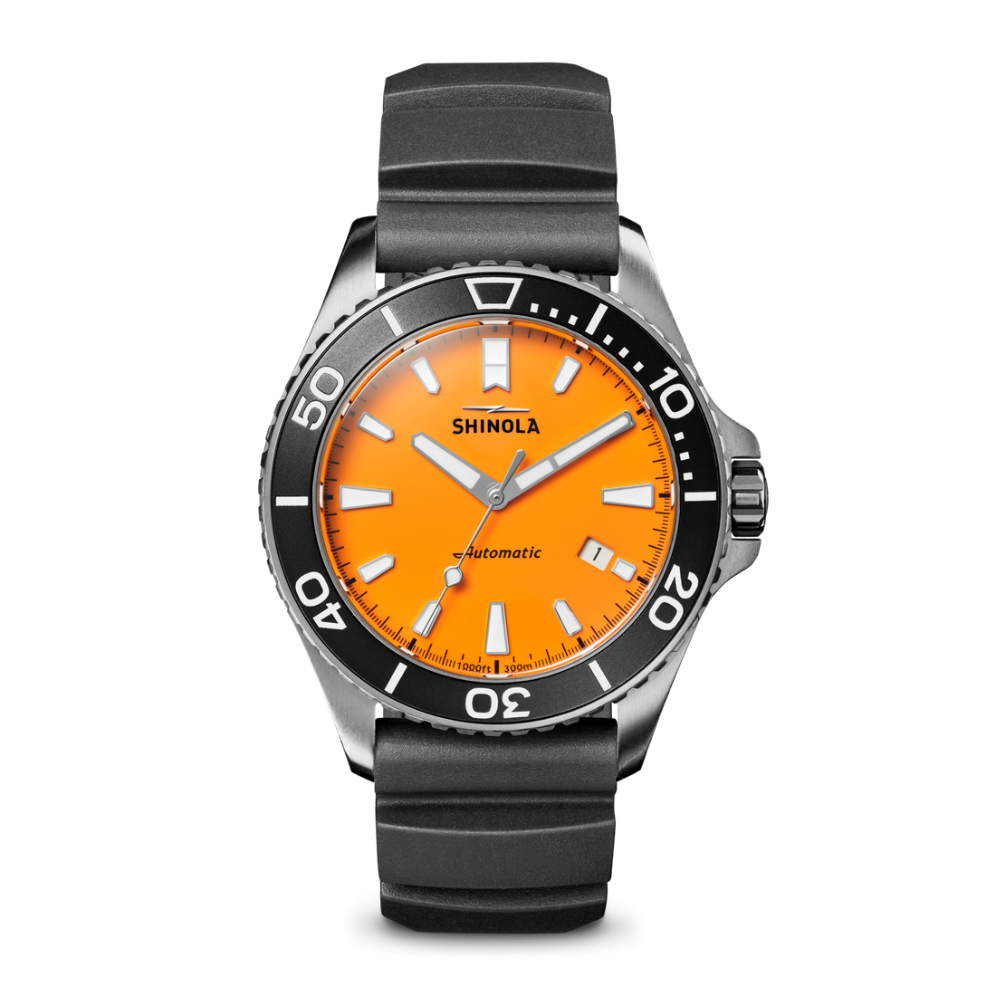 The Shinola Lake Huron Monster Automatic Watch features a bright orange face, black bezel with white markings, silver hands, and a black rubber strap, shown against a white background.