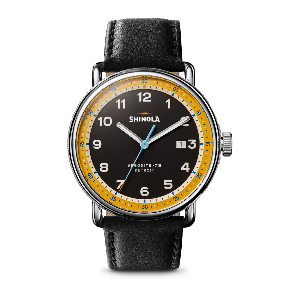 The Shinola Canfield C56 Watch - Black features a black face, yellow outer ring, silver casing, black leather strap, white numerals, and a date window at 3 o’clock—showcasing mid-century modern design with ‘Shinola’ and ‘Argonite-715 Detroit’ on the dial.