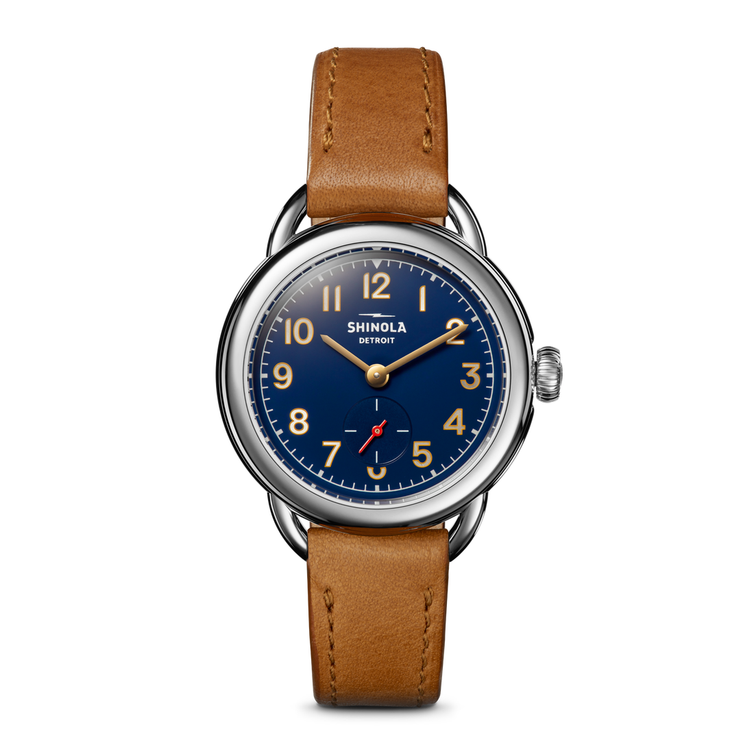 The Shinola Runabout Watch - Navy features a round blue dial, silver case, tan leather strap, gold-tone markers and hands, a small seconds subdial above 6 o’clock, and "Shinola Detroit" on the dial for timeless style.